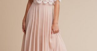 blush chiffon maxi skirt and a lace half sleeve crop top .