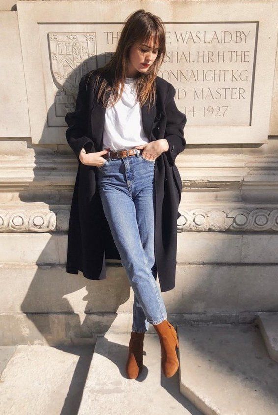 Jeans, white tee long black coat and brown ankle boots .