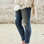 Fall style. Sweater over tunic with distressed jeans and loafers .
