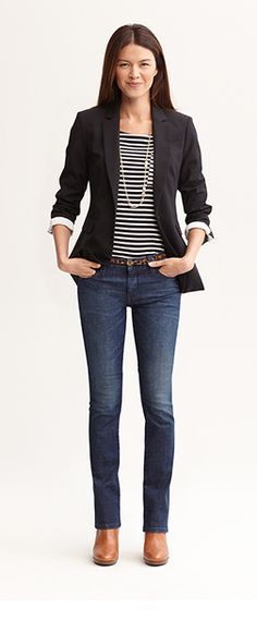 Women's Business Casual. Dark jeans dressed up with a high-neck .