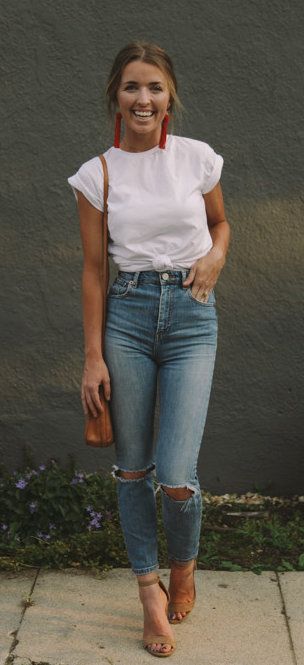 fall #outfits women's white crew-neck t-shirt and distressed blue .