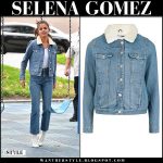 Selena Gomez in denim jacket, cropped jeans and white boots .
