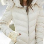 Stunning women's winter fashion! White puffer coat fur lined hood .