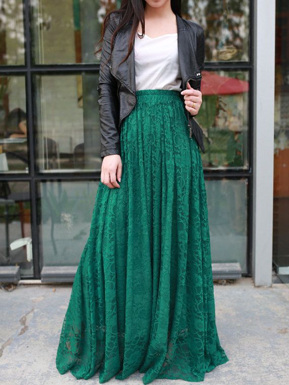 Jade green long maxi skirt with a plain white top. A plain white .