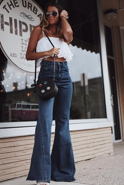 We are throwing it back with these extra wide bell bottom jeans .