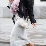 street chic. pink sneakers. fringed scarf. knit dress. leather .