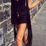 All Black Tank with Fringe Vest and Shorts and Lace-Up Sandals .
