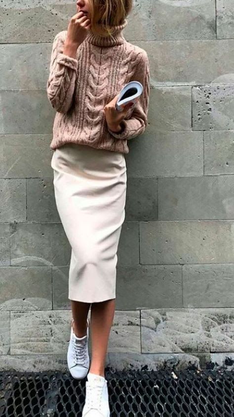 Salmon pink cable knit sweater with khaki pencil skirt and white .