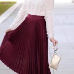 a midi maroon skirt that has already mastered the whole flirty .