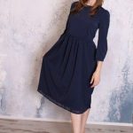 Navy blue midi dress with sleeves coming soon to Mode-sty .
