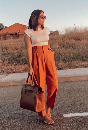 Outfit with combine orange pants with brown sunglasses | Chicisi