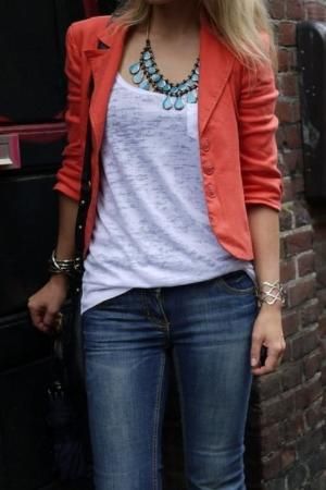 orange blazer jacket blue jeans white top shirt bracelet necklace .