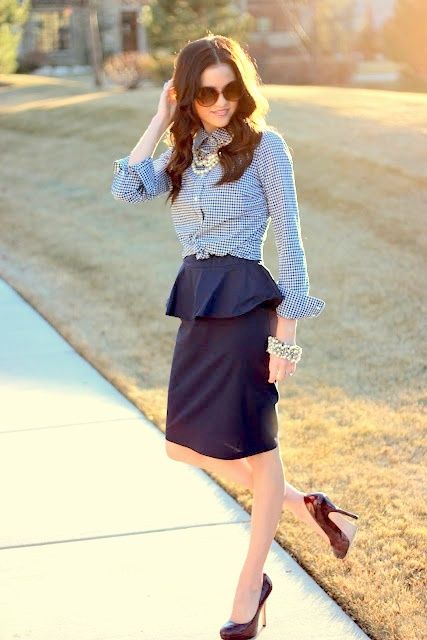 Peplum skirt outfit idea #1. Wear a peplum skirt with a rolled .
