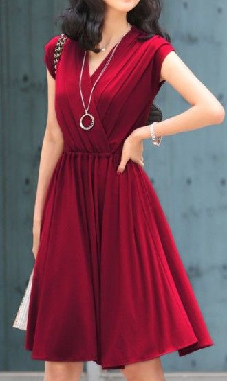 V-neck dress with the perfect amount of accessorizing! | Dark red .