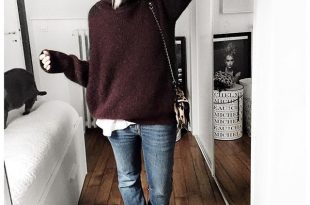 Winter warmth, chic oversized burgundy sweater with relaxed jeans .
