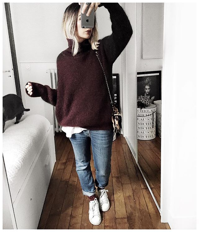 Winter warmth, chic oversized burgundy sweater with relaxed jeans .