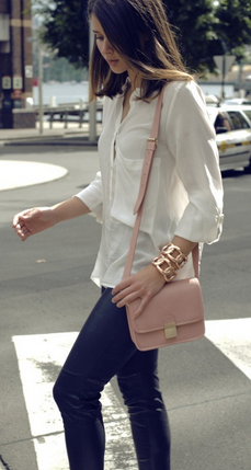 white blouse & leather pants + pale pink purse & gold hardware .