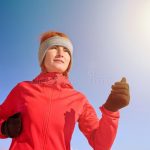 Running Sport Woman. Female Runner Jogging In Cold Winter Park .
