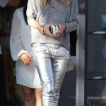 Elle Macpherson all grey with silver pants | Metallic jeans .