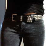 Wearing a studded belt and vehemently denying that you were going .