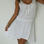 New Free People tunic New never worn. White with sequin at the .