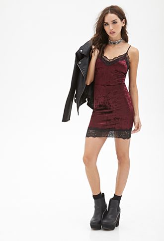 You'll totally be killin' it in this slip dress, crafted from a .