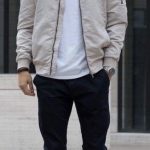 Fall fashion inspiration with a white bomber jacket white t-shirt .