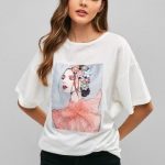 Girl Graphic Floral Pearls Embellished Tee. Discover the trendy .