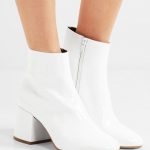 Heel measures approximately 65mm/ 2.5 inches White patent-leather .